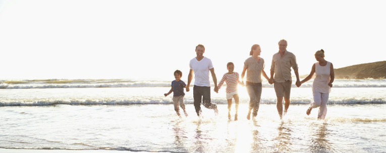 Allianz - Family Playing in the Ocean