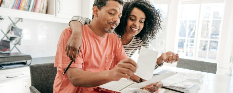 Allianz - two adults reviewing receipts together