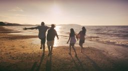 family on spring break vacation at the beach